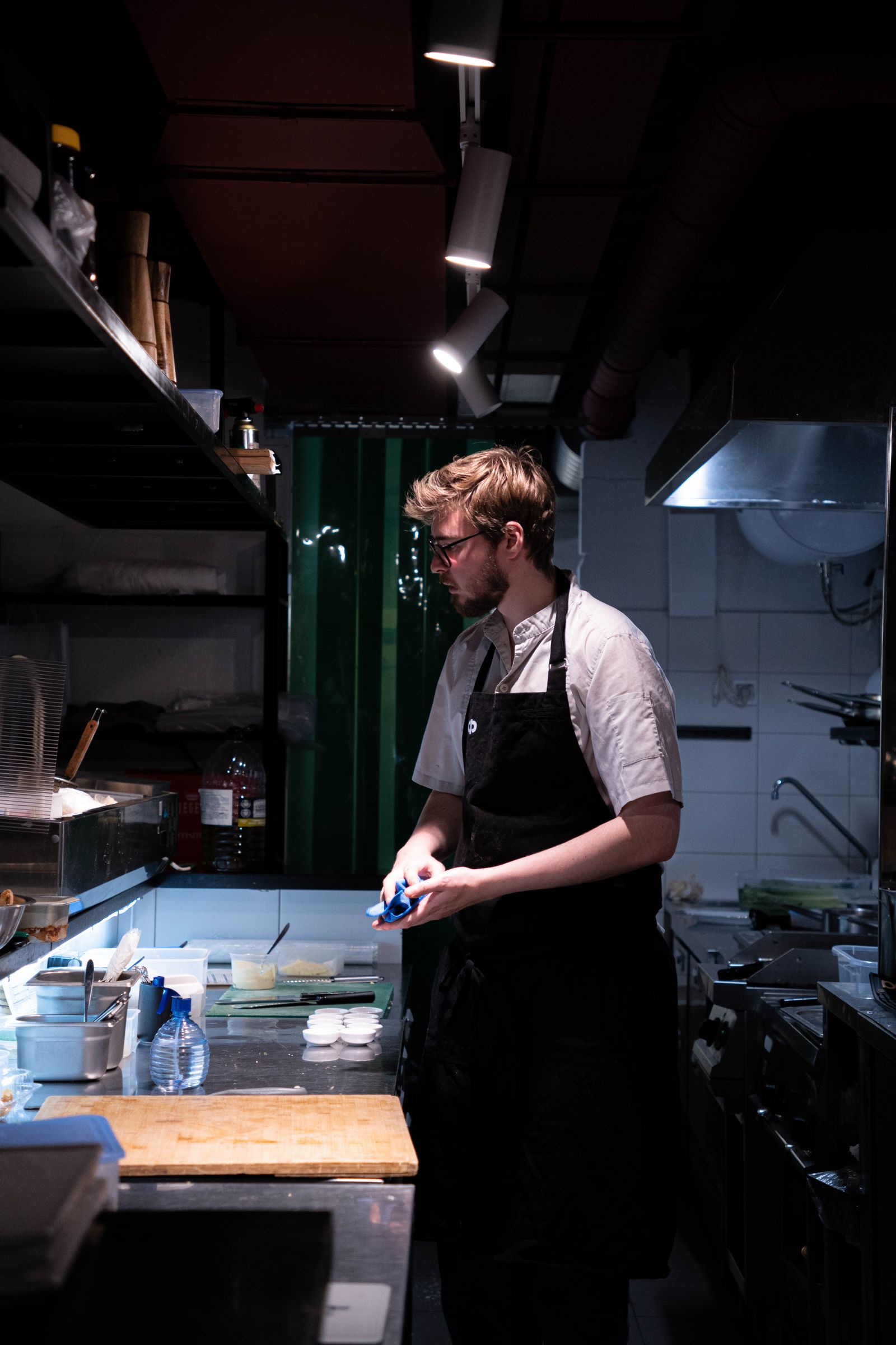 Chef preparing a meal in a restaurant kitchen